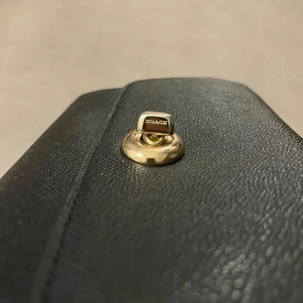 Coach Twist Lock